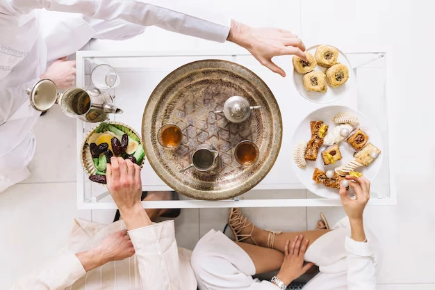 overhead-view-of-tea-fruits-and-desserts-on-table