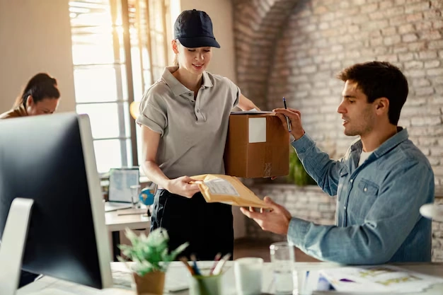woman-handing-package-to-man-in-office-setting