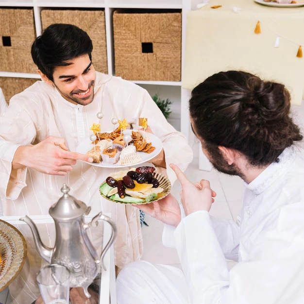 two-people-sharing-plates-of-desserts