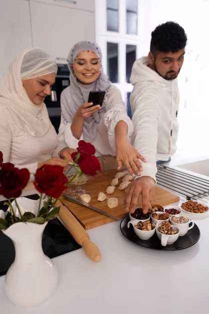 group-of-people-enjoying-eid-snacks-in-the-kitchen